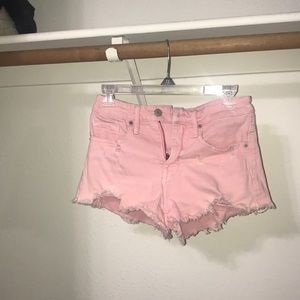 pink shorts.